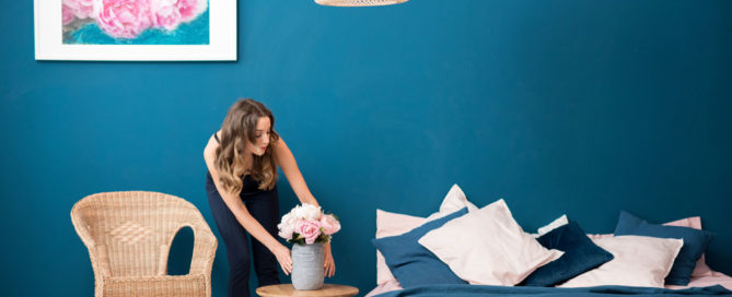 Woman with flowers at home